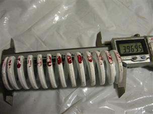 (image for) WHITE with red stripe 4" inch long 1.23" OD .67" ID compression Spring die press