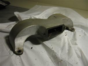 (image for) casting manifold 1920s antique Elto Super G outboard motor